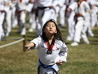 В погоне за рекордом: 8 тысяч бойцов тхэквондо в Сеуле. Фоторепортаж