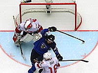 Финны проиграли швейцарцам, латвийцы - шведам