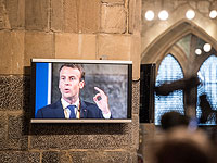 В Париже появились изображения Макрона в нацистской форме и с израильским флагом