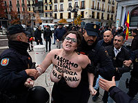 Голая грудь против фашизма и памяти генерала Франко: акция FEMEN в Мадриде