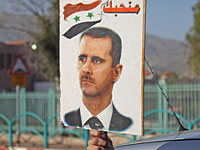 Ближайший советник Асада посетил Каир