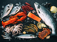 Праздничный стол с морскими и мясными деликатесами от Cancun  