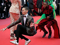 Танцы и первые красавицы на красной дорожке в Каннах. Фоторепортаж 
