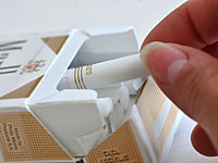 Компания Philip Morris снизила цены на три вида своей продукции в Израиле