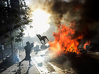 Беспорядки в Чили: протест, переросший в погромы. Фоторепортаж
