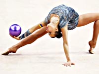 В купальнике на снегу. Украинская гимнастка, чемпионка мира, порадовала поклонников соблазнительной фотографией