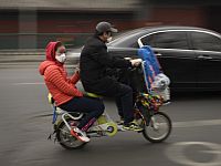 В Китае из-за нового коронавируса приостановили транспортное сообщение, это коснулось почти 30 миллионов человек