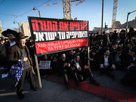 Харедим в Иерусалиме перекрыли проспект, вступившись за сына раввина эфиопской общины. Фоторепортаж