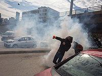 День присяги нового правительства Ливана: беспорядки в Бейруте. Фоторепортаж