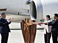 Олимпийский огонь прибыл в Японию