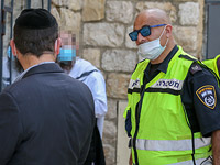 Полиция выплатит компенсацию религиозному мужчине, задержанному в шаббат без необходимости