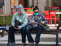 Власти Израиля ужесточают карантинные меры: за отсутствие масок будут штрафовать. Фоторепортаж