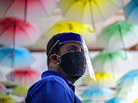 Смягчение карантина на фоне рекордной заболеваемости. Фоторепортаж из Рио-де-Жанейро