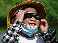 Солнечное затмение от Дубая до Пекина. Фоторепортаж