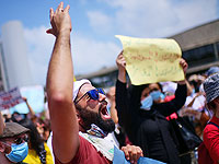 Акция протеста соцработников в Тель-Авиве в день начала забастовки. Фоторепортаж