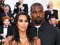 Ким Кардашьян пытается  