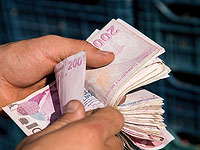 Курс турецкой лиры рухнул до рекордно низкой отметки, несмотря на усилия центробанка