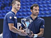 Победителями Открытого чемпионата Австралии в парном разряде стали Додиг и Полашек