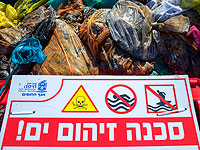 Продолжается расчистка пляжей Израиля от нефтепродуктов. Фоторепортаж