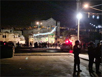 В Лоде полицейские ранили подозреваемого, бросившего бутылку с 