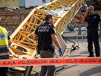 В Рамат-Гане на жилой дом перевернулась платформа с подъемным краном