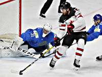 Чемпионат мира по хоккею. Канадцы и шведы одержали непростые победы