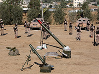 Боевики ФАТХа вышли на военный парад в Газе: