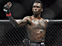 UFC. Исраэль Адесанья победил. Морено 