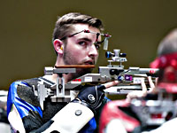 Олимпиада. Стрельба из пневматической винтовки. Победил американец. Россиянин занял восьмое место