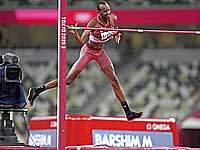 Олимпиада. Прыжки в высоту. Победил легкоатлет из Катара. Белорус на третьем месте