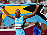 Олимпиада. Бег на 400 метров. Победил спортсмен с Багамских островов. Американцы без медалей