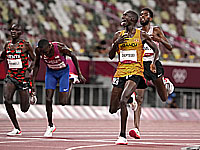 Олимпиада. бег на 5000 метров. Победил спортсмен из Уганды