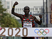 Олимпиада. Марафон. Победил кениец. Израильтянин на 13-м месте