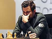 Матч за шахматную корону. Первая партия завершилась вничью