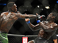 UFC. Волкановсски в третий раз победил Холлоуэя. Адесанья защитил титул