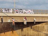 Куклы, изображающие людей, появились на мосту над 2-м шоссе. Подробности