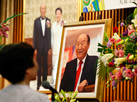 Церковь объединения признала, что мать убийцы экс-премьера Японии является членом этой организации