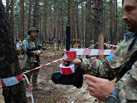 Полиция Украины: на деоккупированной территории Харьковской области найдены могилы и тела сотен погибших