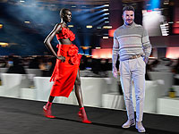 Показ мод перед финалом ЧМ в Катаре: Дэвид Бекхэм и другие. Фоторепортаж