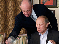 Евгений Пригожин и Владимир Путин в 2011 году 