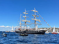 Олимпийский огонь доставлен во Францию. Фоторепортаж