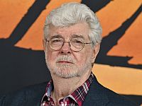 Кинорежиссеру Джорджу Лукасу, создателю