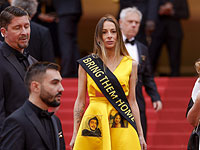 Каннский кинофестиваль: ослепительные звезды и память о трагедиях. Фоторепортаж