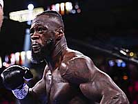 Бокс. Чжан Чжилей нокаутировал экс-чемпиона мира Деонтея Уайлдера