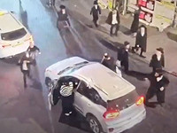 В Иерусалиме во время сирены ультраортодокс сорвал флаг с остановившейся машины. Видео