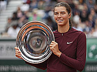 Победители юниорского Открытого чемпионата Франции: Лилли Таггер и Нильс Макдональд