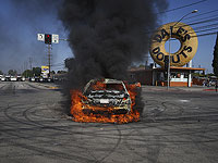 Протесты в Лос-Анджелесе после рейдов иммиграционной полиции. Фоторепортаж