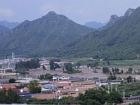 Наводнения и оползни в Пекине, десятки погибших