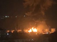 Удар БПЛА взывал пожар на нефтебазе в Сочи, борьбу с огнем ведут более 100 человек