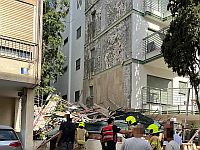 Обрушение строительных лесов в Тель-Авиве, есть пострадавшие